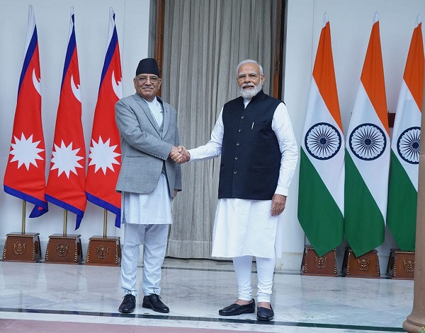 PM Modi and Pushpa Dahal (file picture)