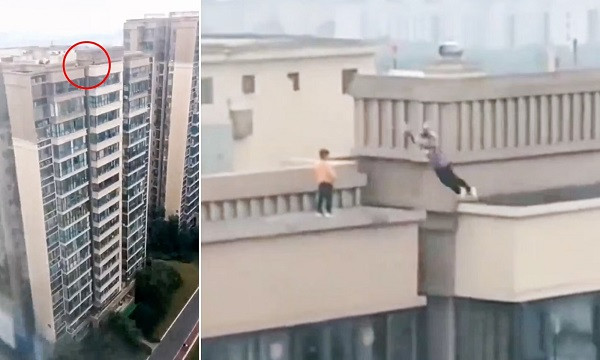 Two men jump tallest building (symbolic picture)
