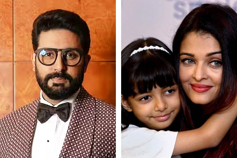 (Left) Abhishek Bachchan, Aishwarya with daughter Aaradhya