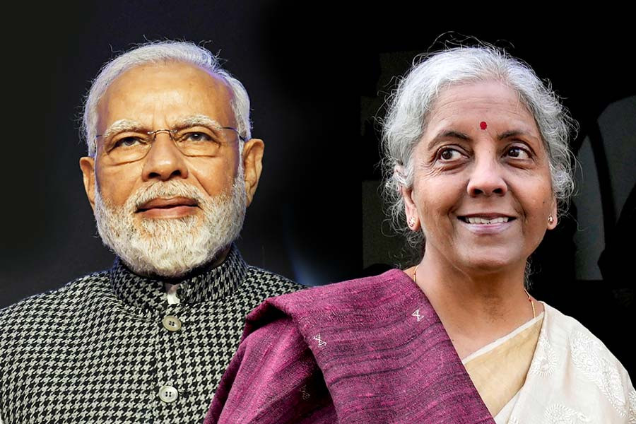 (Left) Narendra Modi and Nirmala Sitharaman