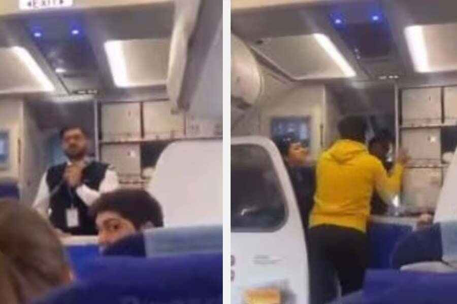 The passenger is accused of punching the pilot inside the plane