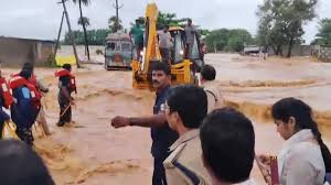 Andhra Pradesh heavy rains, Vijayawada flooding, Telangana rainfall alert,