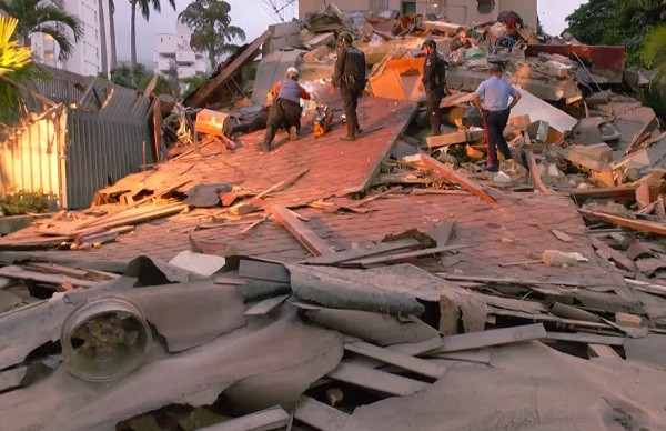 Death toll from earthquake in Venezuela rises to 1,719; many still missing.