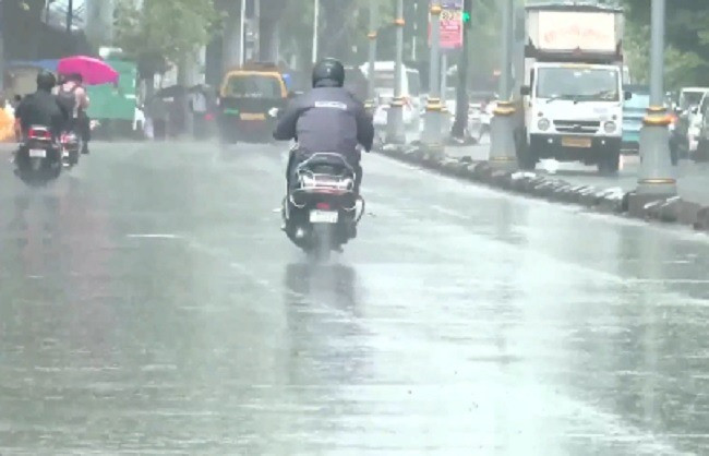 Heavy rain lashes Mumbai again on Tuesday; pre-monsoon showers hit the commercial capital.