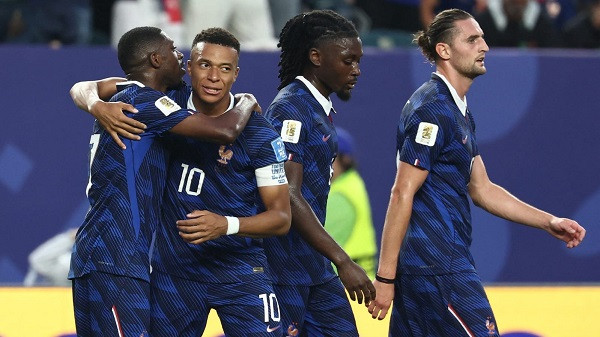 Mbappé scores a brace; France advances to the knockout stage after beating Iraq.