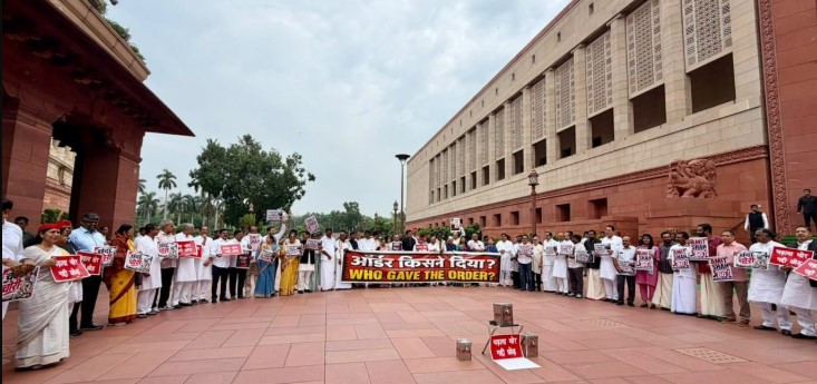INDIA bloc targets the Centre; opposition protests in Parliament complex.